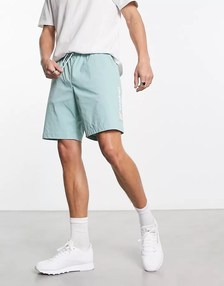 Pantalones cortos azul claro con logo lateral Attenders