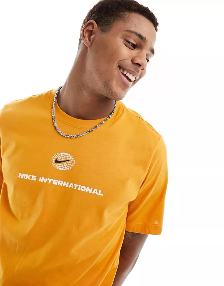 Camiseta naranja Dri-FIT Heritage de Nike Running Naran