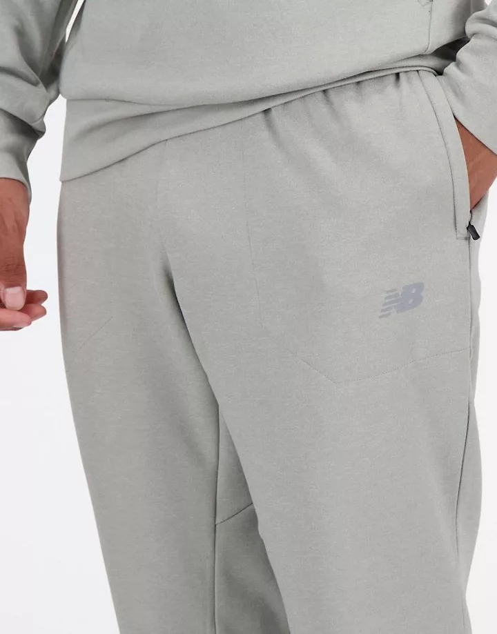 Pantalones grises de punto Tech de New Balance Gris 7AVznDEk