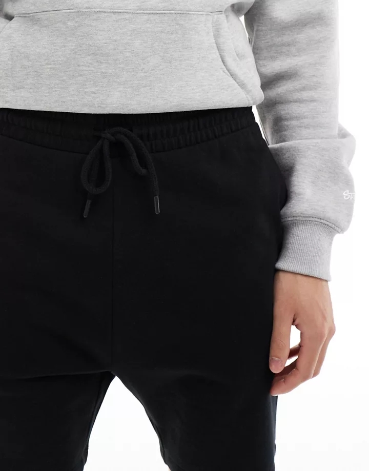 Pack de 2 pantalones cortos de color negro y gris jaspeado de corte pitillo y largo medio de DESIGN Negro y gris jaspeado 7depNojG