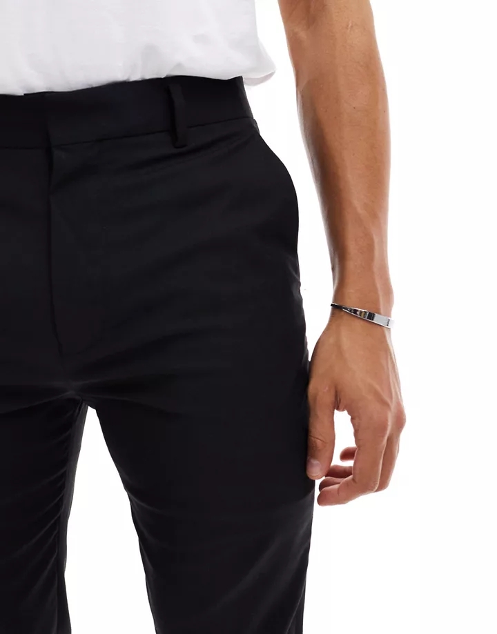 Pantalones pitillo de traje en negro de DESIGN Negro 7eVbz84f
