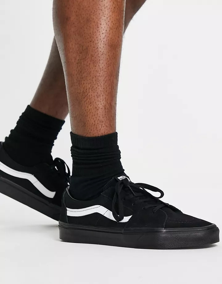 Zapatillas de deporte negras con rayas laterales blanca