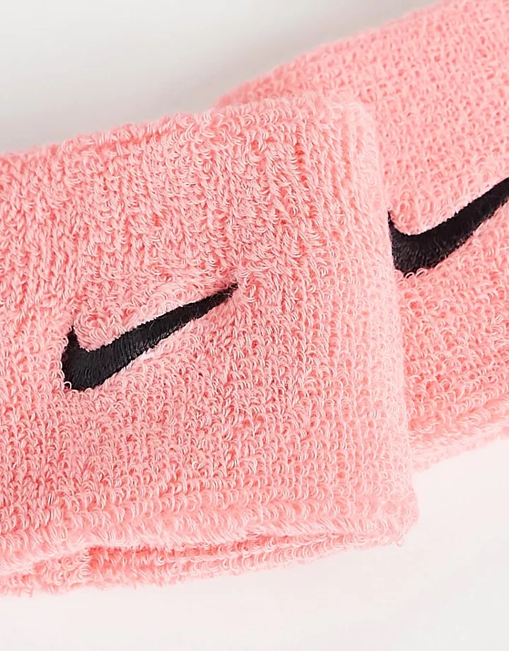Muñequeras rosas unisex con logo de Nike Training Rosa bb34xcf3